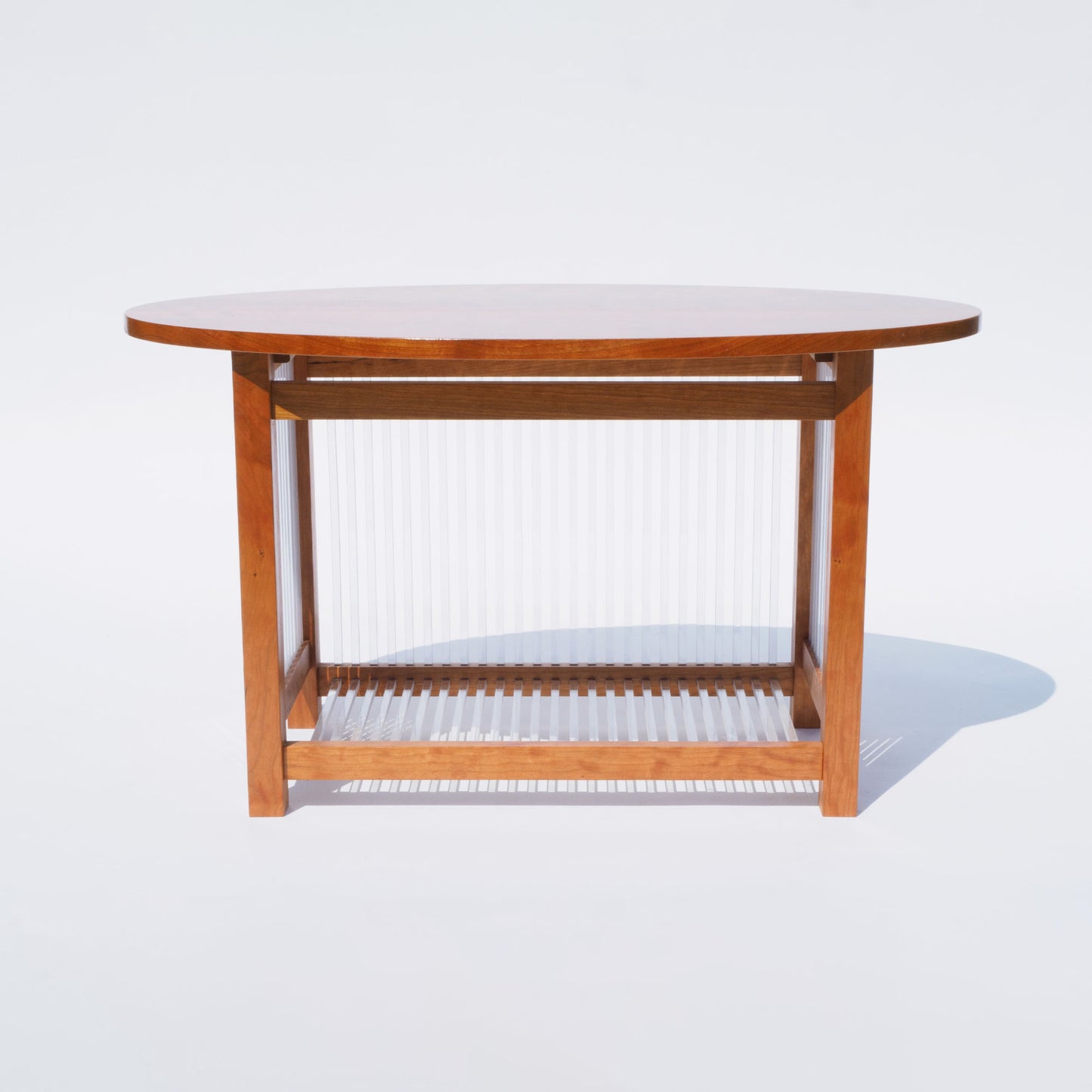 43 Oval Cherry and Polycarbonate End Table